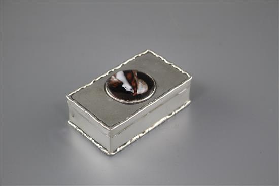 An Edwardian silver and enamelled cabochon set rectangular box and hinged cover, the enamel decorated with the bust of a lady
